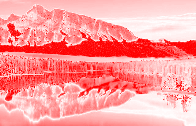 In this example, we isolate the saturation channel. We input an image of a beautiful landscape featuring a majestic rock and its reflection in calm water. After processing with the tool, we obtain an output representation of saturation, where more saturated colors are depicted in shades of red, and less saturated colors are represented in shades of white. (Source: Pexels.)