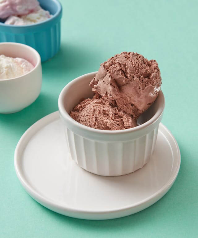 In this example, we apply a random pixel sorting method to an image of delicious chocolate ice cream. We create large blocks of 80×80 pixels, find their average color, and rearrange them randomly. To make the output unique, we also decorate the blocks with a 2-pixel thick chocolate-colored border, add 5-pixel spacing between the blocks, and 5-pixel padding around the image. The background color of the canvas is set to white. (Source: Pexels.)