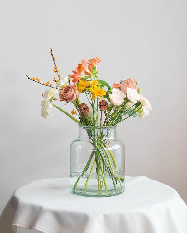 In this example, a beautiful flower bouquet image is reduced in size three times using a downscale percentage of 33.33%. The tool preserves the image's proportions while reducing its dimensions and also gently smoothes the pixels of the reduced image using the pixel smoothing option. (Source: Pexels.)