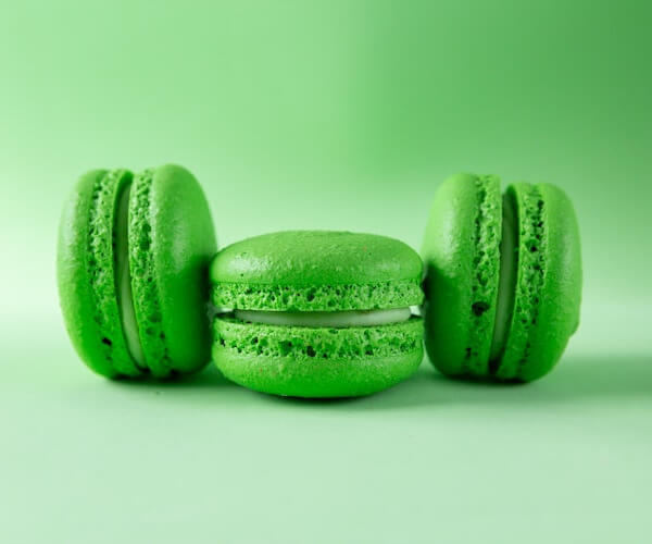 This example removes a lime-green border from all sides of the green macaroon image. It trims two vertical strips, each 40 pixels wide, from the left and right, and two horizontal strips, also 40 pixels wide, from the top and bottom. (Source: Pexels.)