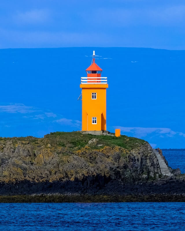 In this example, we display the orange-blue (I) channel to showcase a stunning image of a lighthouse perched on a cliff. This channel reveals the color transition from orange to blue within the YIQ color scheme. (Source: Pexels.)