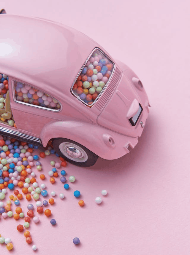 In this example, we subject an image of a bright pink toy car to analysis to verify that it's in GIF format. Visually, the image displays a limited color palette, but that alone doesn't guarantee the GIF format. Only after the tool's examination and a green notification can we be confident about the GIF format. (Source: Pexels.)
