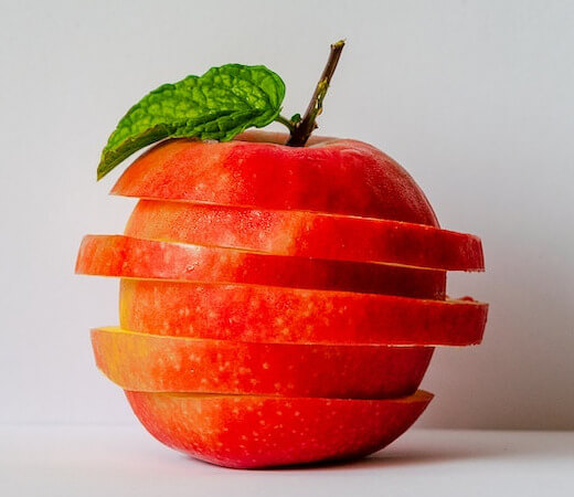 In this example, we switch to gradient transparency mode and create a linear semitransparent effect on half of the image. We select a rectangular region on the right side of the ripe apple and apply a linear transition of opacity from 100% (at the center) to 5% (on the right side). (Source: Pexels.)
