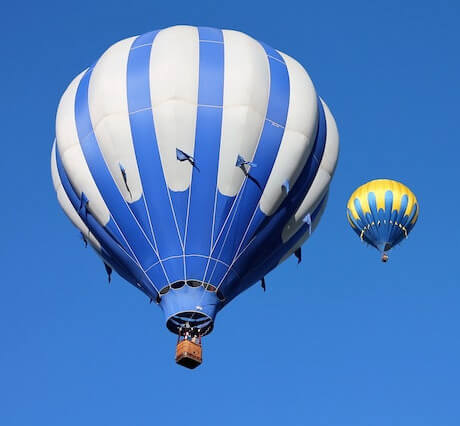 In this example, we extract the red, green, and blue colors from the image of a hot air balloon and then convert them into gray tones. The grayscale color representation allows for a reliable assessment of the quantity of each color channel in the image. At first glance, it may have seemed that there was more of a green hue in the image than blue. However, by transforming the color channels into grayscale tones, it becomes evident that blue color dominates in the image. (Source: Pexels.)