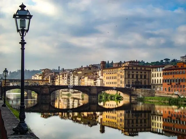 In this example, we use dithering to create a black and white WebP of the Ponte Vecchio bridge in Florence. Dithering uses dots of varying density to simulate shades of gray, resulting in smoother transitions between light and dark colors. Here, we use the Burkes dithering method, which is great for reducing artifacts and preserving detail. (Source: Pexels.)