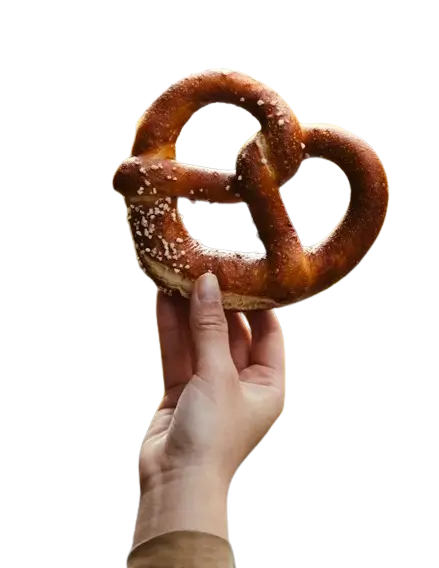 In this example, we remove the transparency from a WebP image of a pretzel and fill the transparent areas with a beautiful linear gradient. The gradient smoothly transitions from light pink (#ff719a) to soft yellow (#ffe29f) through medium pink (#ffa99f). This completely removes transparency from the WebP and adds a bright gradient background to the WebP image. (Source: Pexels.)