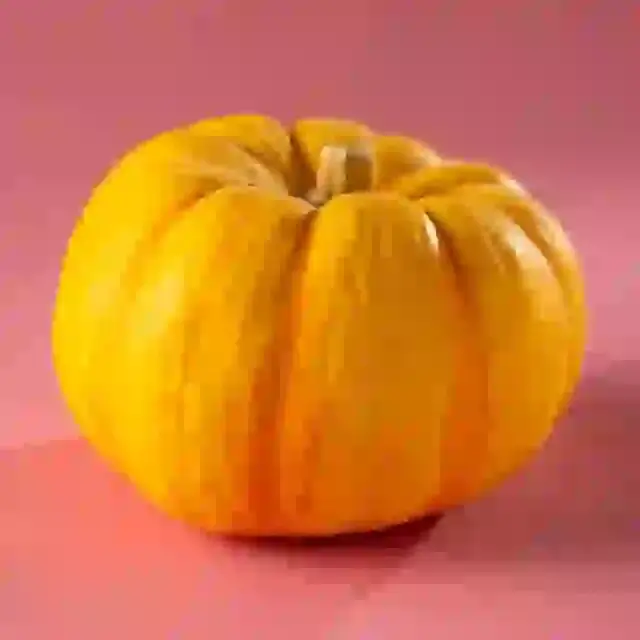 In this example, we drastically reduce the quality of a WebP photo of a pumpkin to 0%. This transformation creates a visual glitch effect, turning the WebP into an abstract and pixelated representation. The pumpkin loses all details, sharpness, and color brightness, only retaining its basic shape. (Source: Pexels.)